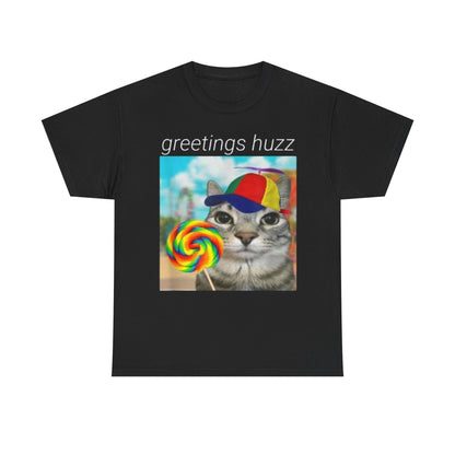 A black crew neck t-shirt with the text 'greetings buzz' and a graphic print of a cat wearing a hat and holding a lollipop.