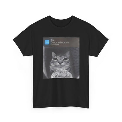 A black crew neck t-shirt featuring a graphic of a cat with money standing in front of a ring camera