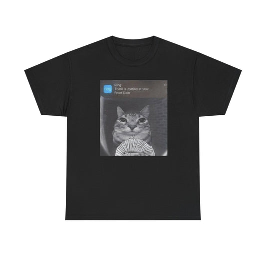 A black crew neck t-shirt featuring a graphic of a cat with money standing in front of a ring camera