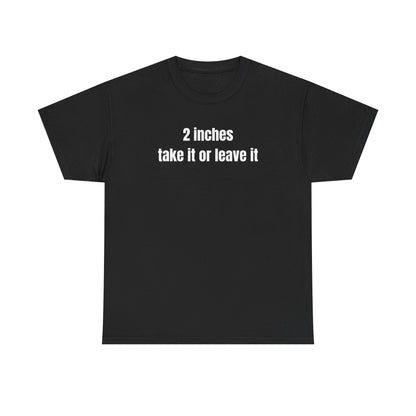 A black crew neck t-shirt with the text '2 inches take it or leave it' printed on the front.