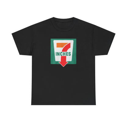 A black crew neck t-shirt with a graphic print in the center that reads '7 Inches' with a down arrow, all in bold colors.
